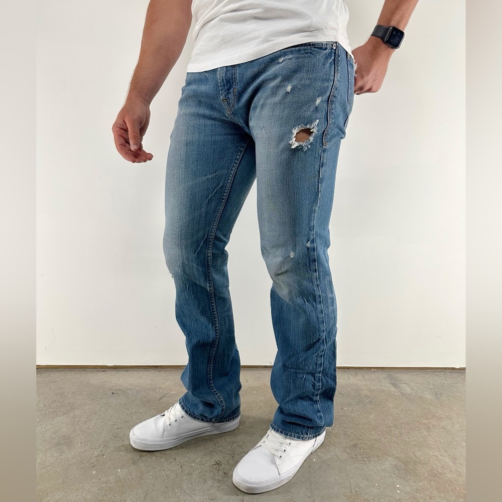 AMERICAN EAGLE / Blue Jeans Distressed Slim Straight / Size 31 - 32